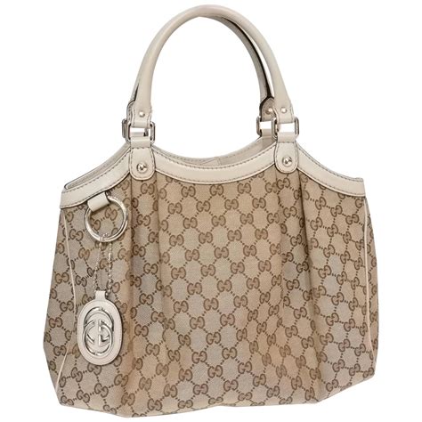 gucci white embossed bag|Gucci monogram shoulder bag.